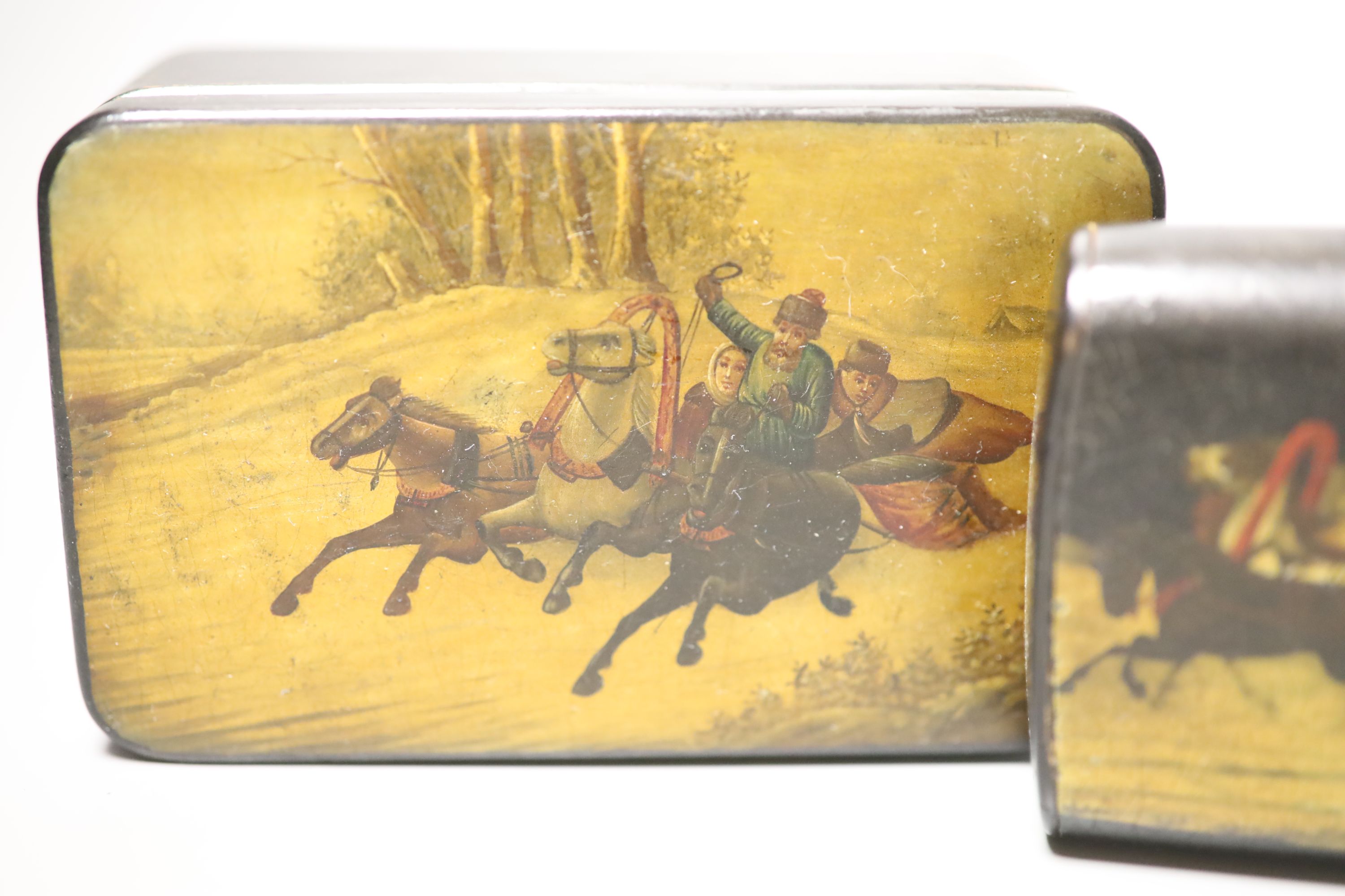 Two Russian papier mache boxes painted with troika and two related items, largest 17 x 5cm